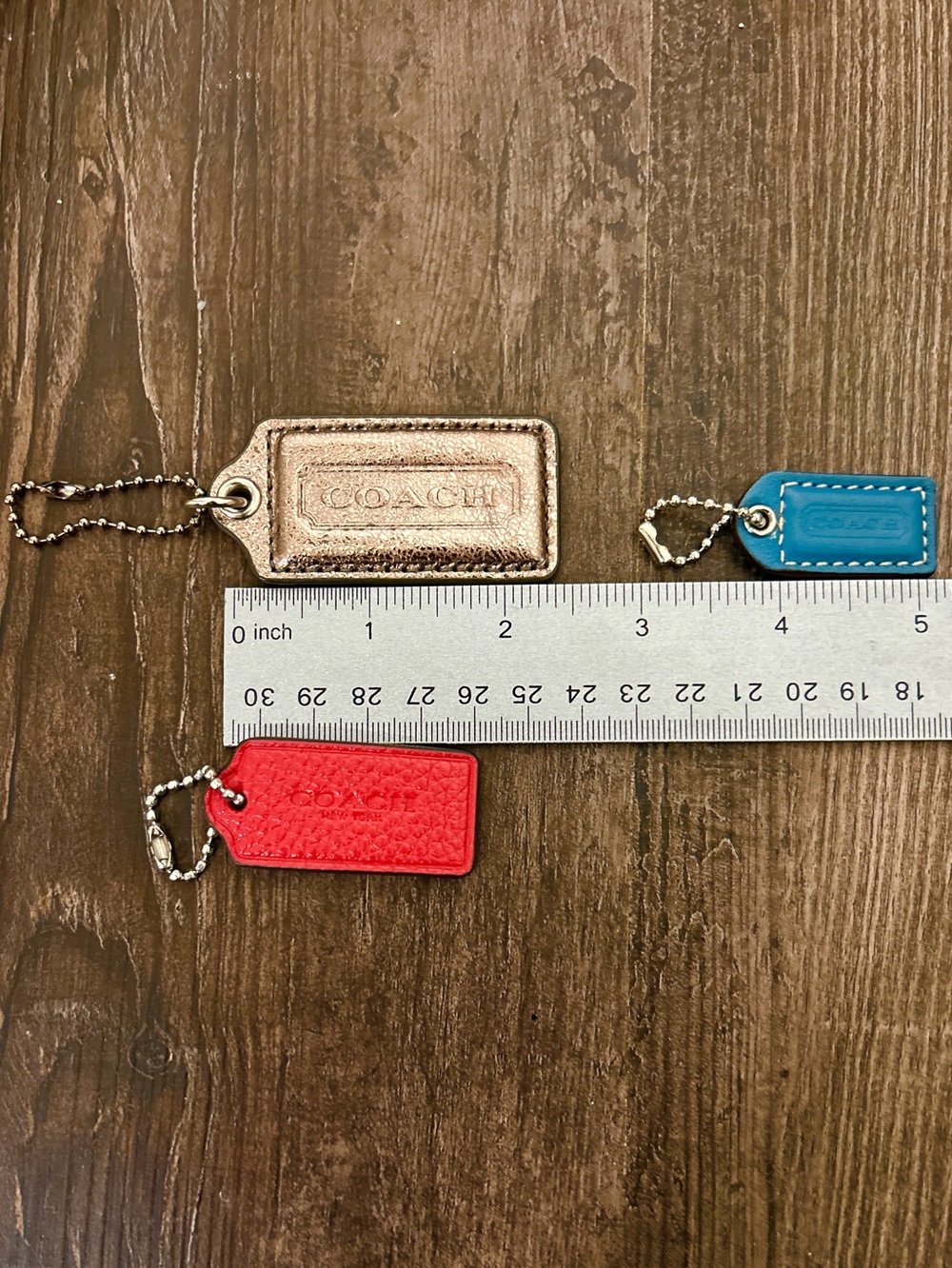 3 Coach Leather Bag Hang Tags with Ball and Chains. Metallic, Red & Blue